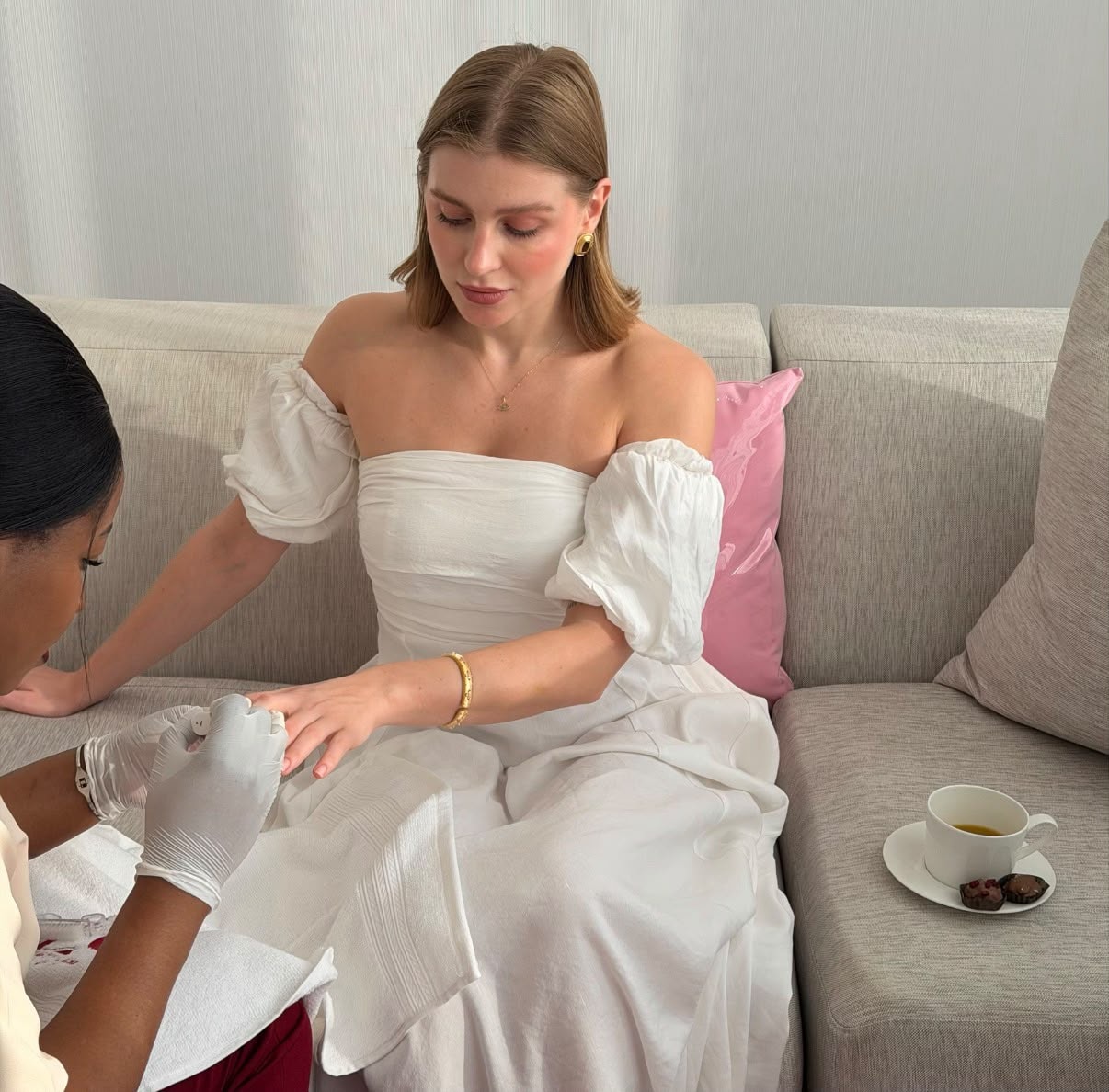 Client receiving a manicure at Say Beauty